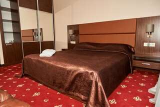 Отель Monro Novoekonomicheskoye Стандартный номер с кроватью размера "king-size"-1